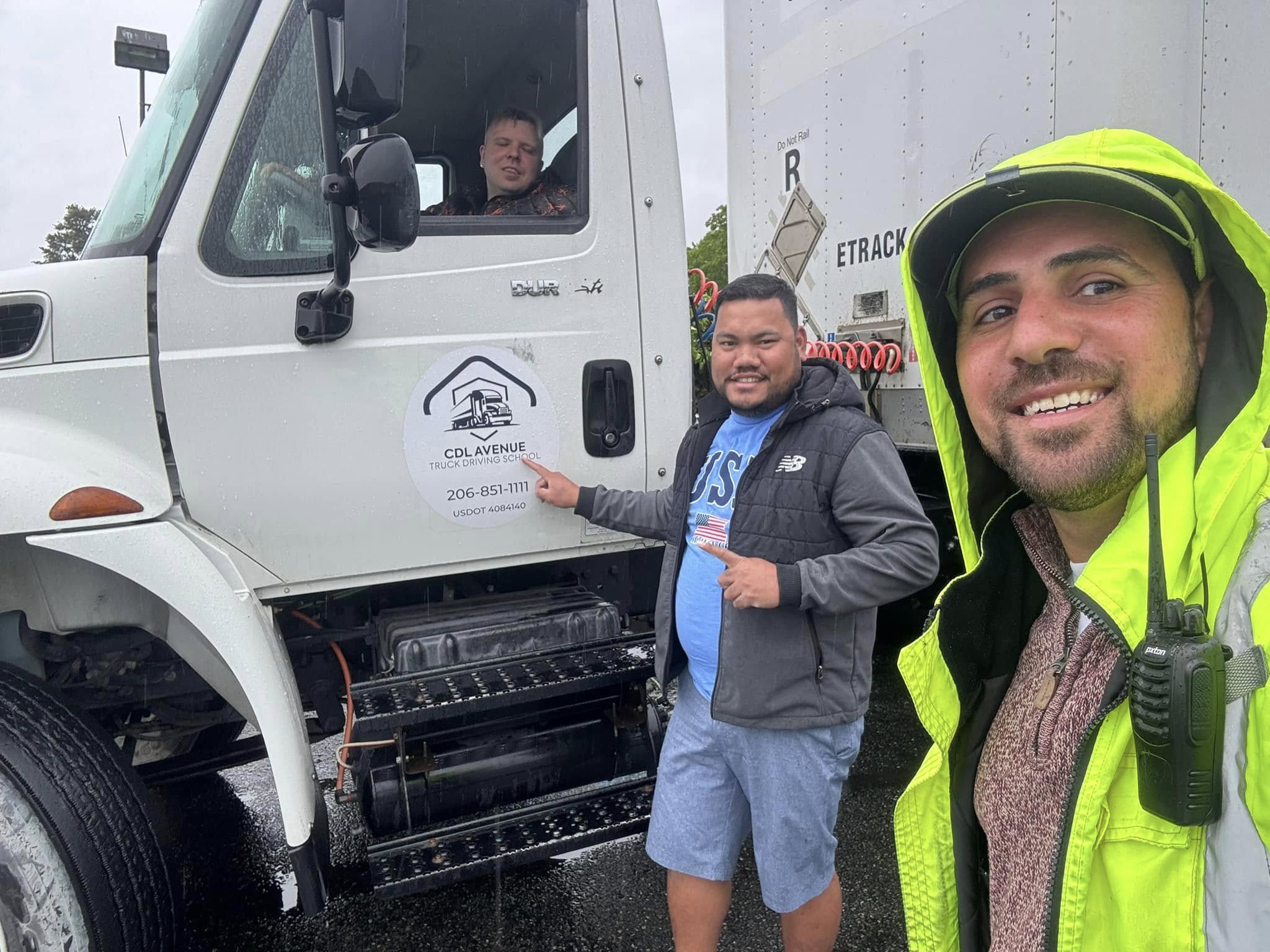 Rafi with students by the CDL Avenue truck