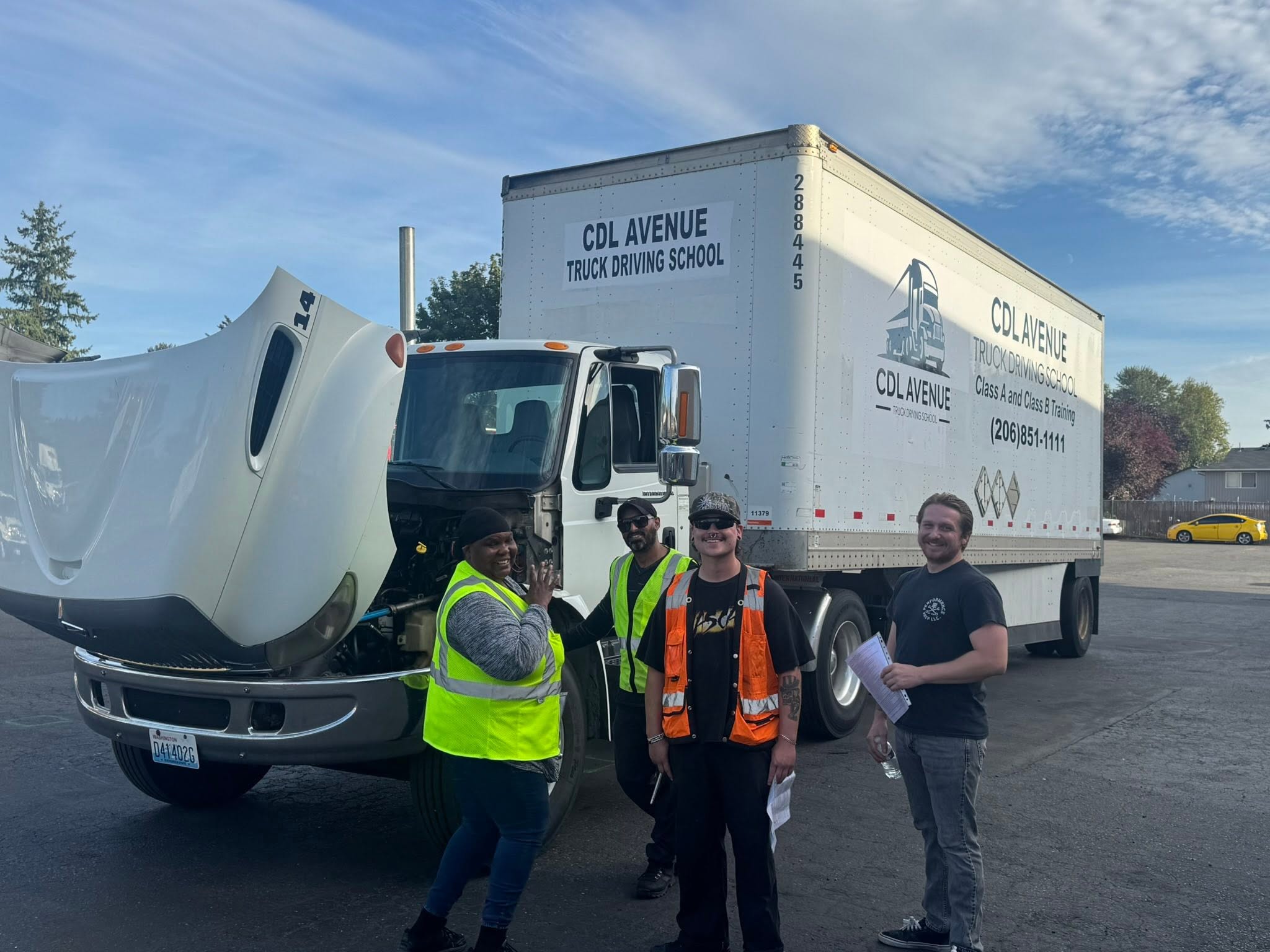 Students with CDL Avenue box truck during pre-trip inspection
