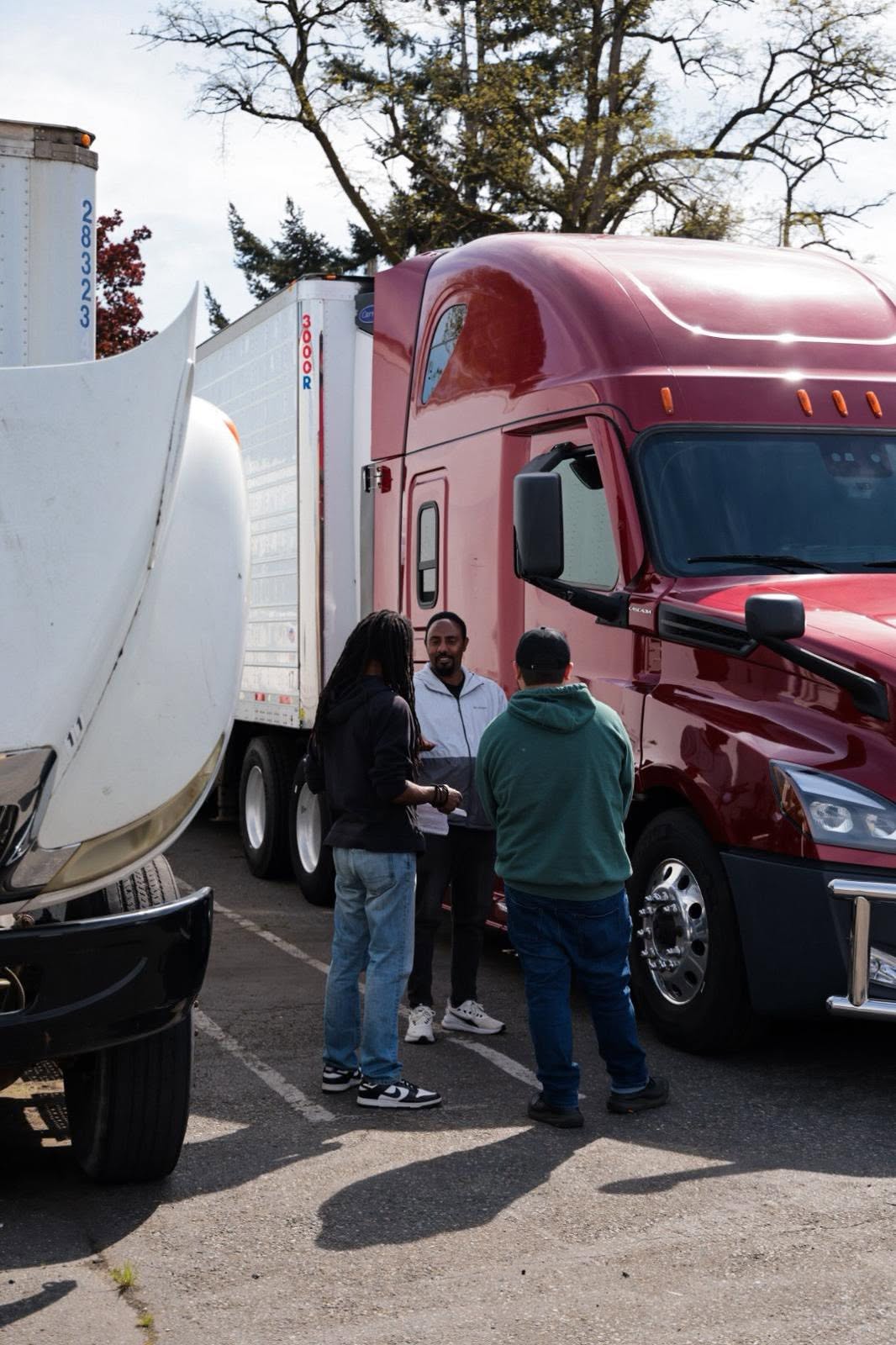Students training with semi trucks at CDL Avenue